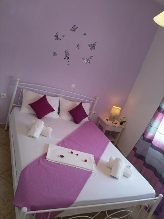 Posteľ alebo postele v izbe v ubytovaní Nikoletta Rooms