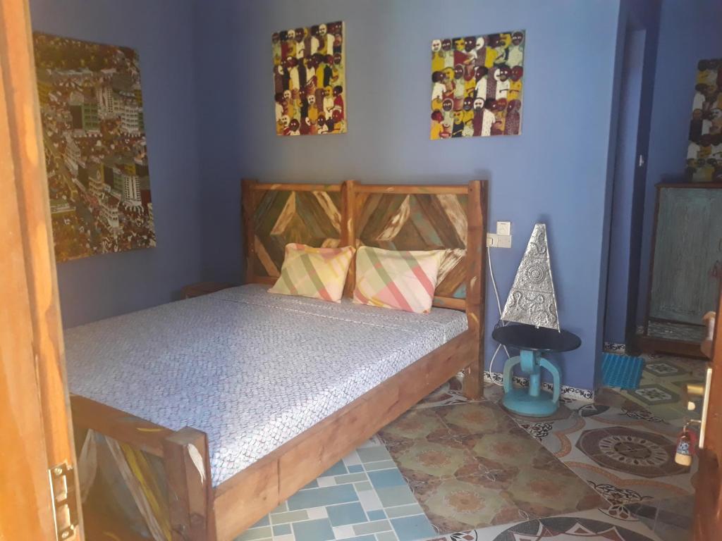 Postel nebo postele na pokoji v ubytování Coccobello Zanzibar