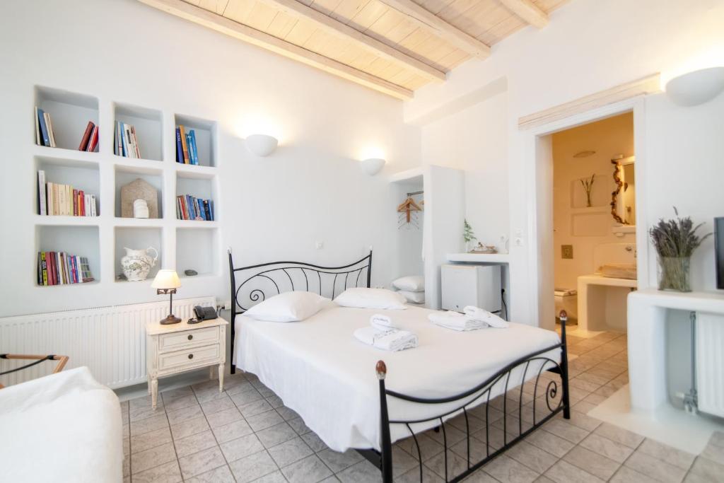 Voodi või voodid majutusasutuse Vincenzo Family Rooms toas