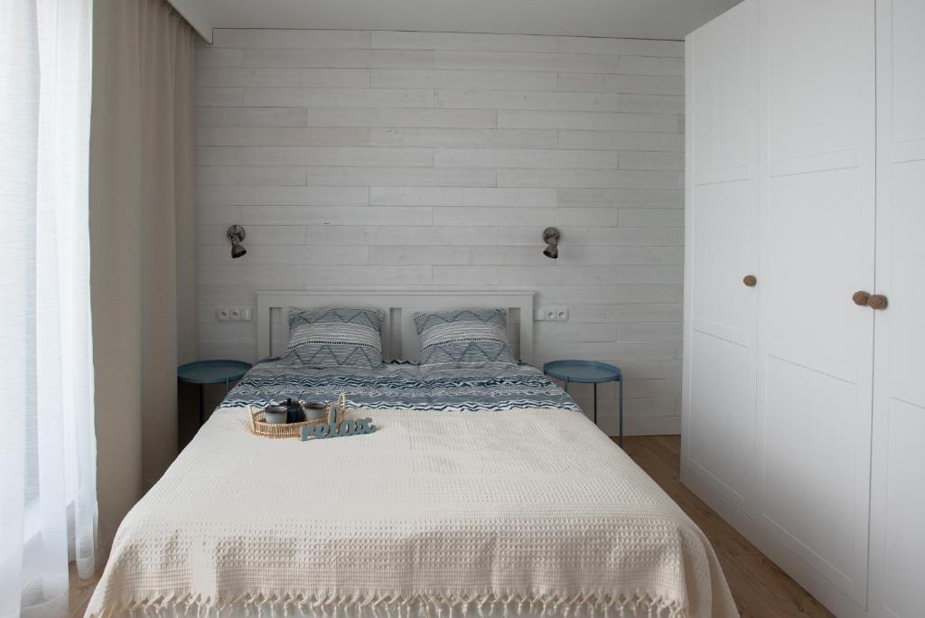 Postel nebo postele na pokoji v ubytování Apartament Zefir Mechelinki