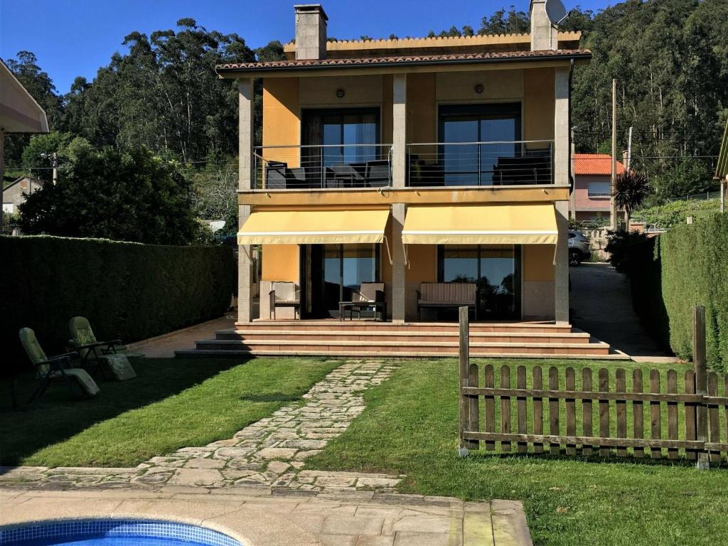 A garden outside Beautiful house in Cangas near the beach