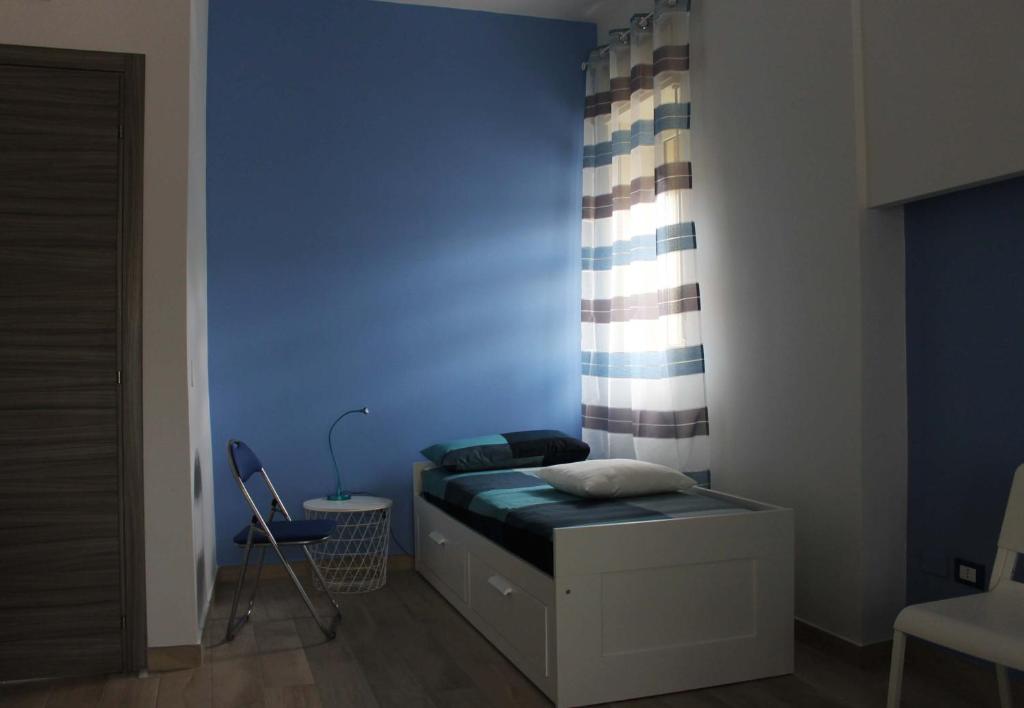 A bed or beds in a room at b&b Appiddaveru