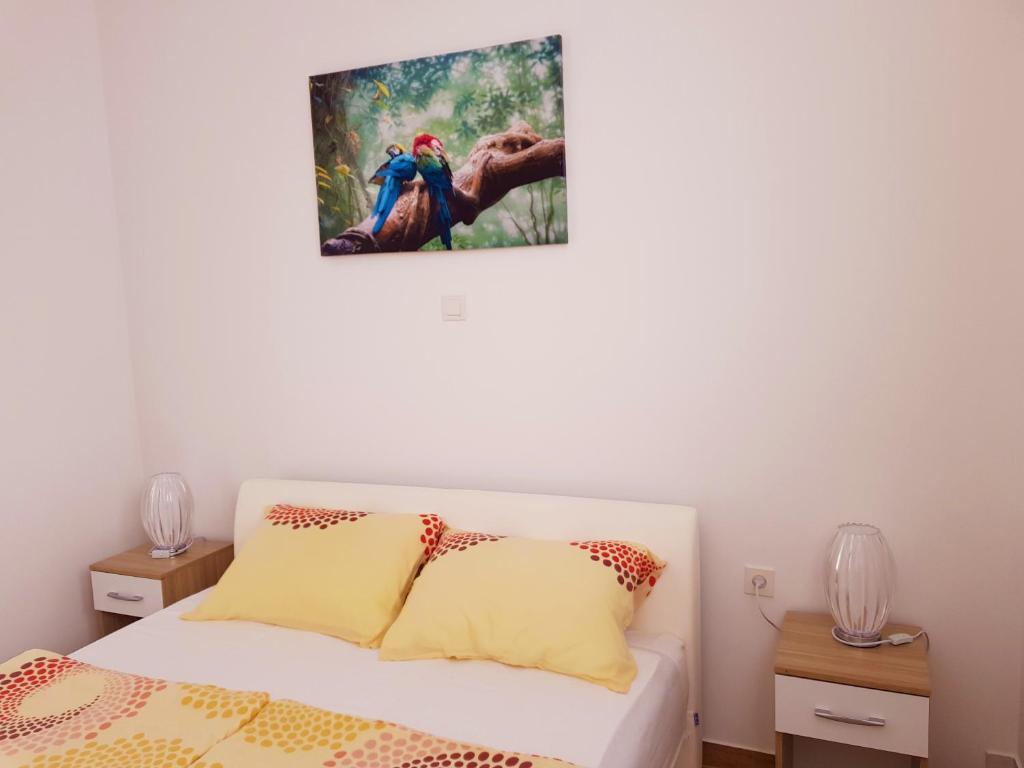 Postel nebo postele na pokoji v ubytování Apartments Korana, BelajskePoljice