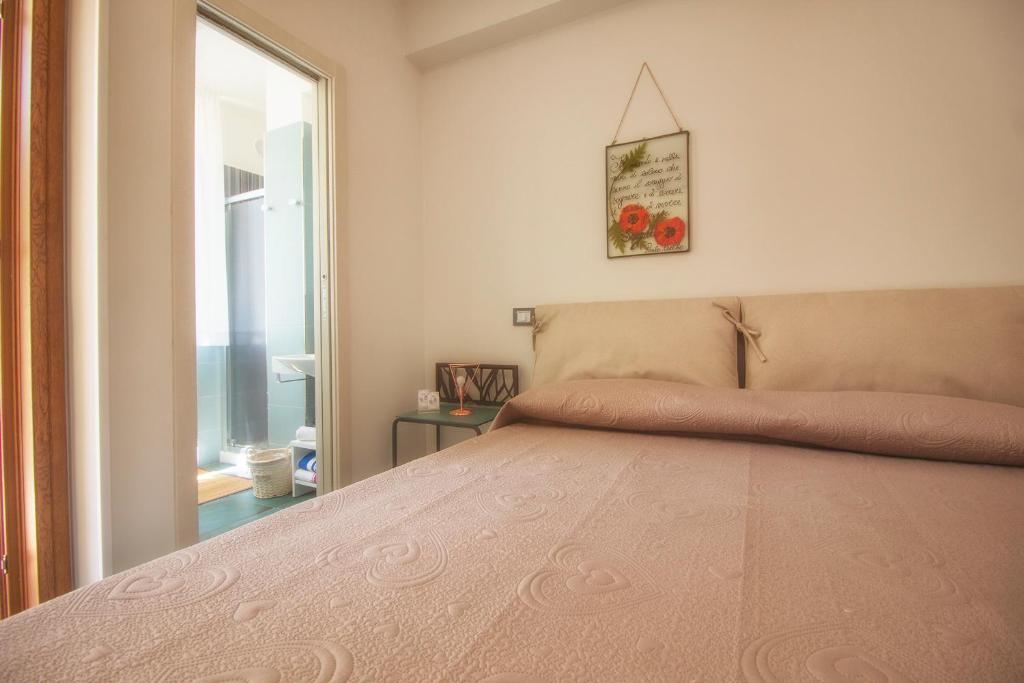 Letto o letti in una camera di B&B Carol
