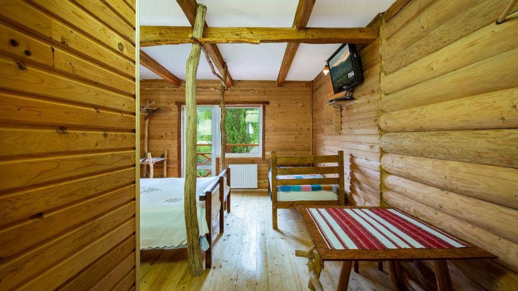 TV a/nebo společenská místnost v ubytování Eco Centr Zrub