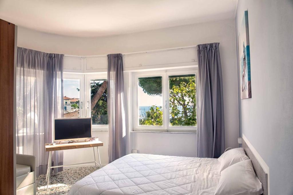 Postel nebo postele na pokoji v ubytování Hotel Costa Verde