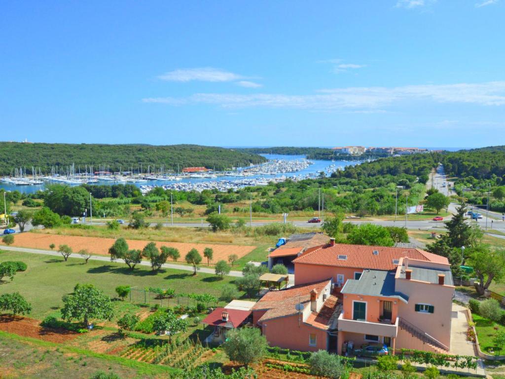 an aerial view of a house with a marina at Apartment Adriana by Interhome in Pješčana Uvala 