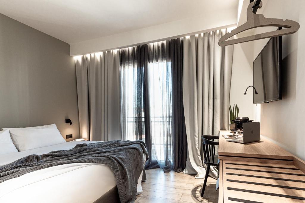 Postel nebo postele na pokoji v ubytování 31 Doors Hotel
