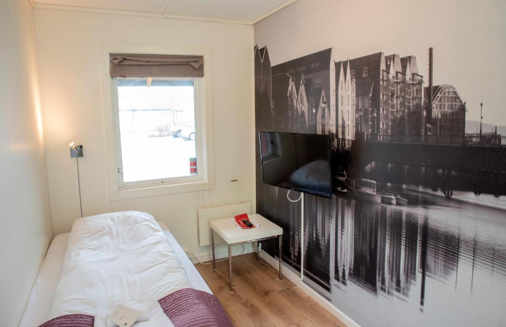 TV a/nebo společenská místnost v ubytování Sandmoen Bed & Breakfast, Free Parking