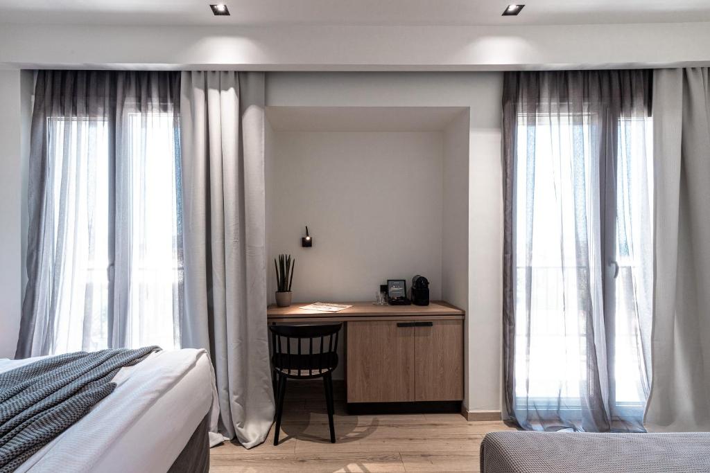 Postel nebo postele na pokoji v ubytování 31 Doors Hotel