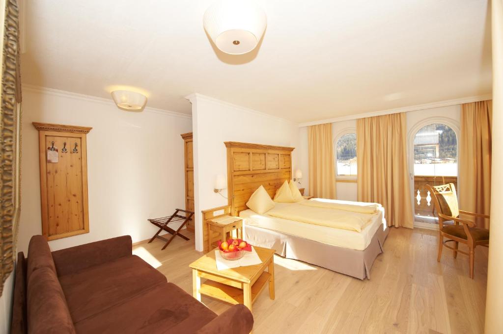 Postel nebo postele na pokoji v ubytování Hotel Lisa