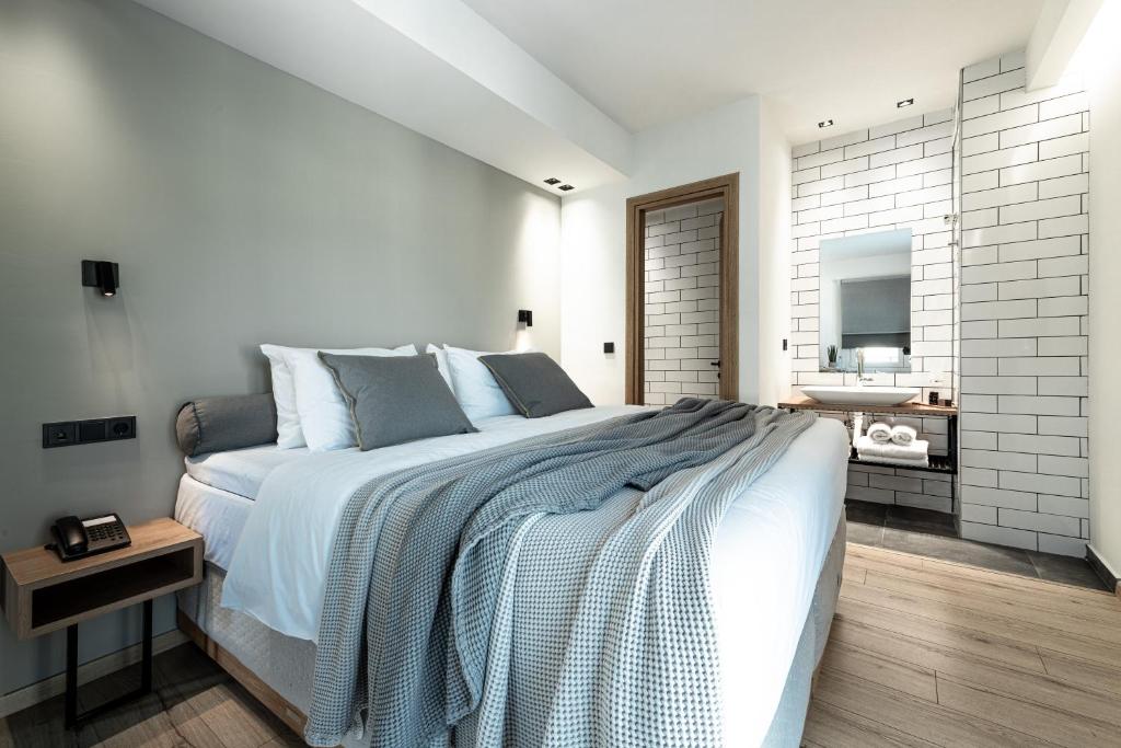 Postel nebo postele na pokoji v ubytování 31 Doors Hotel
