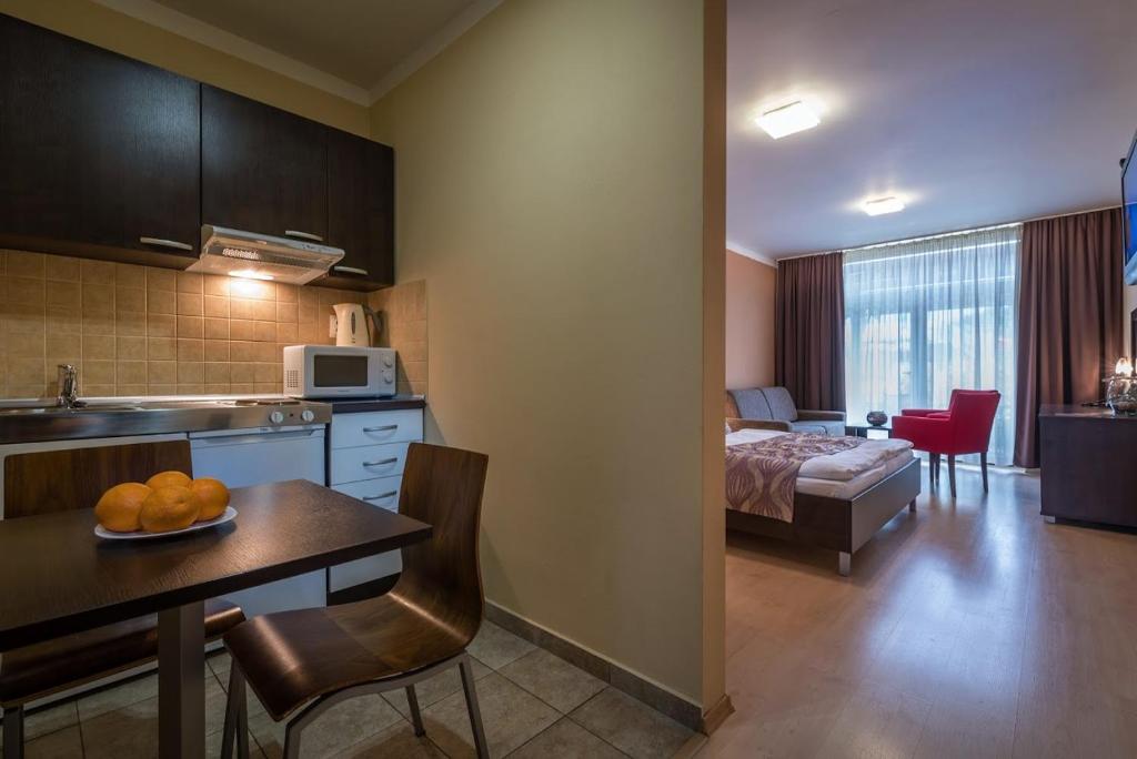 A bed or beds in a room at Apartmán Bešeňová