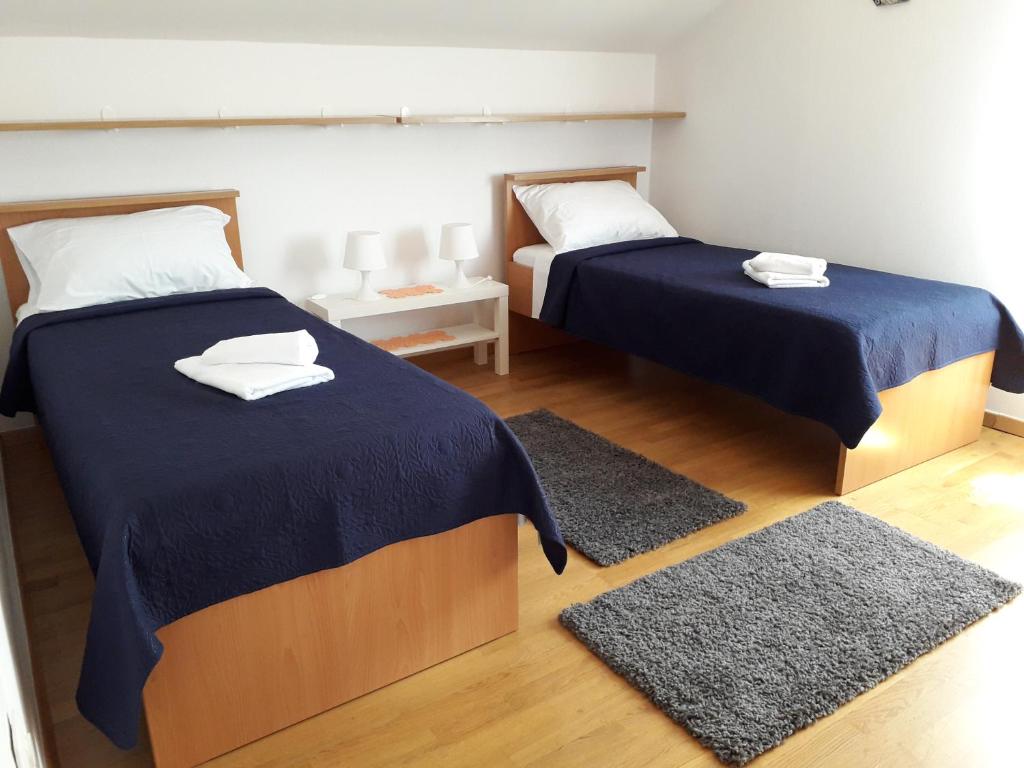 Posteľ alebo postele v izbe v ubytovaní Rustic Apartment Mariva