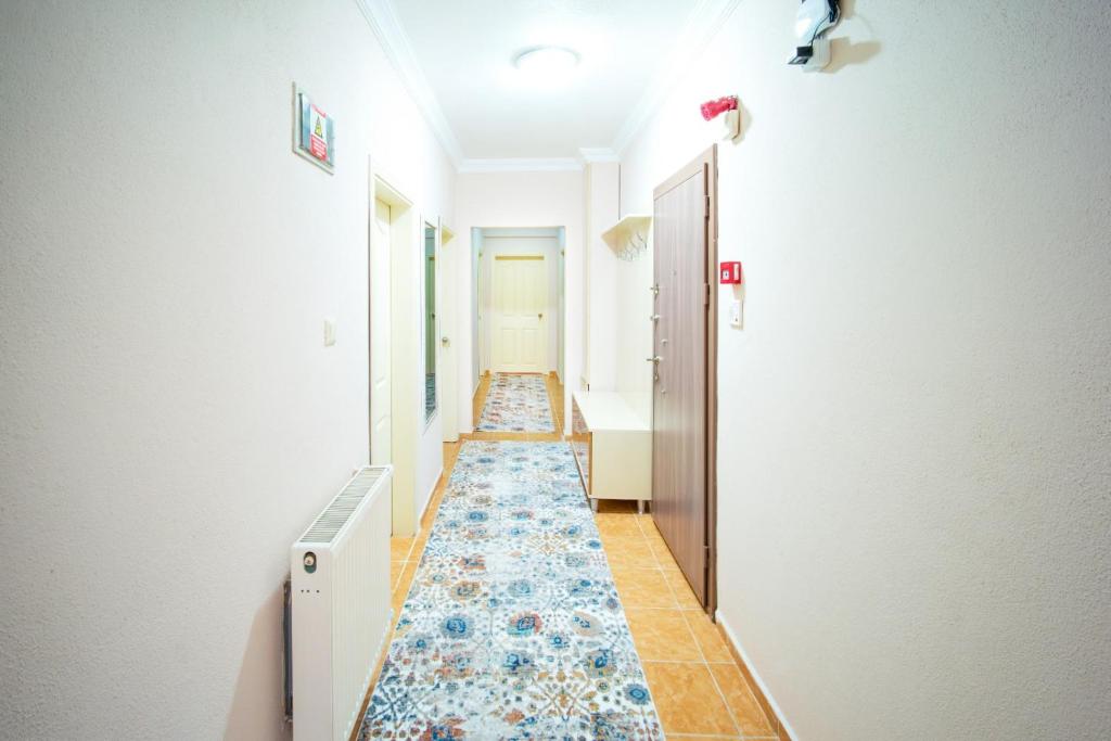Postel nebo postele na pokoji v ubytování Cayeli Kent Apart