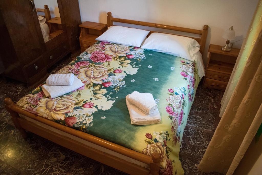 Posteľ alebo postele v izbe v ubytovaní Vaggelis Traditional House