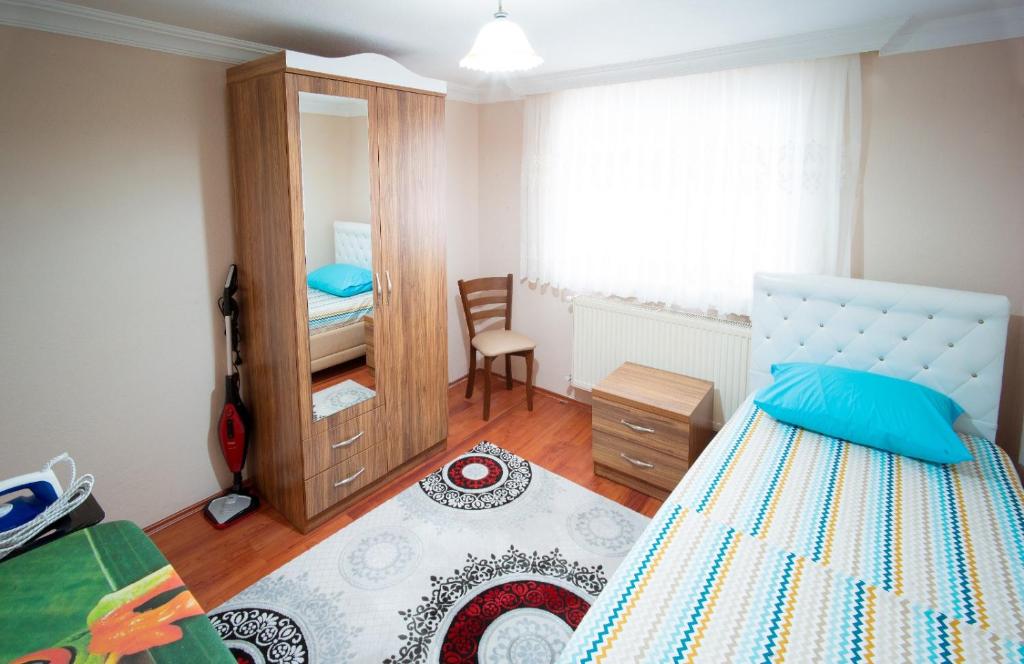 Postel nebo postele na pokoji v ubytování Cayeli Kent Apart