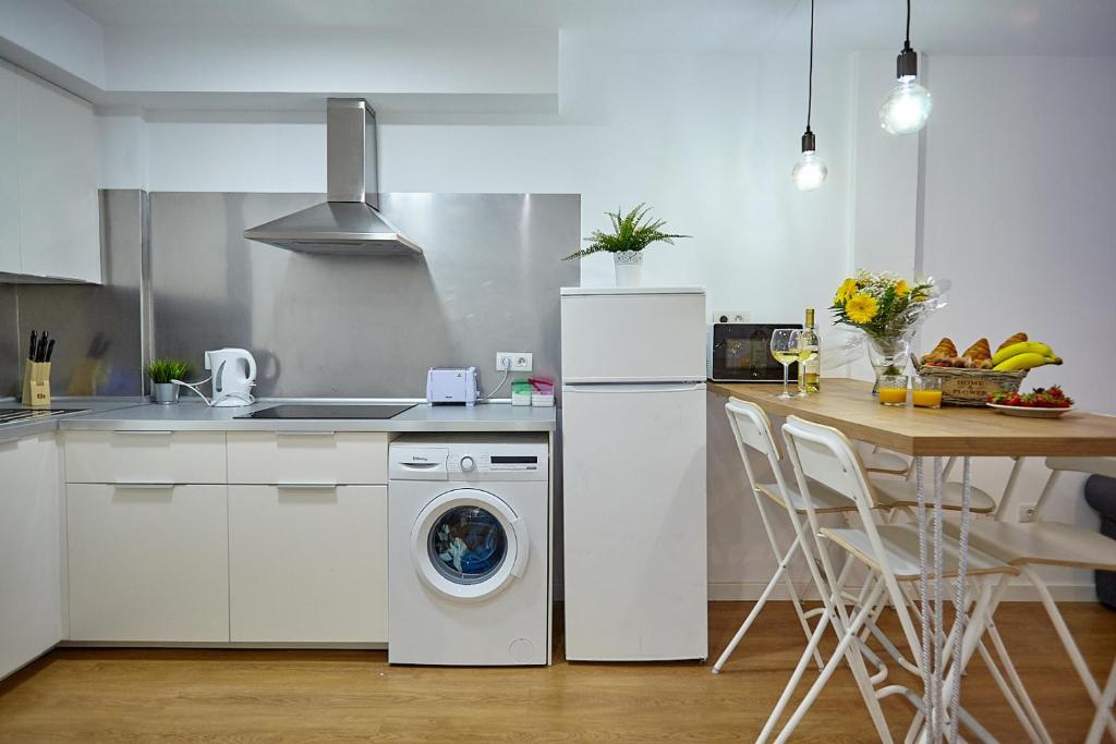 Kuchyň nebo kuchyňský kout v ubytování Apartamento Sol y Mar