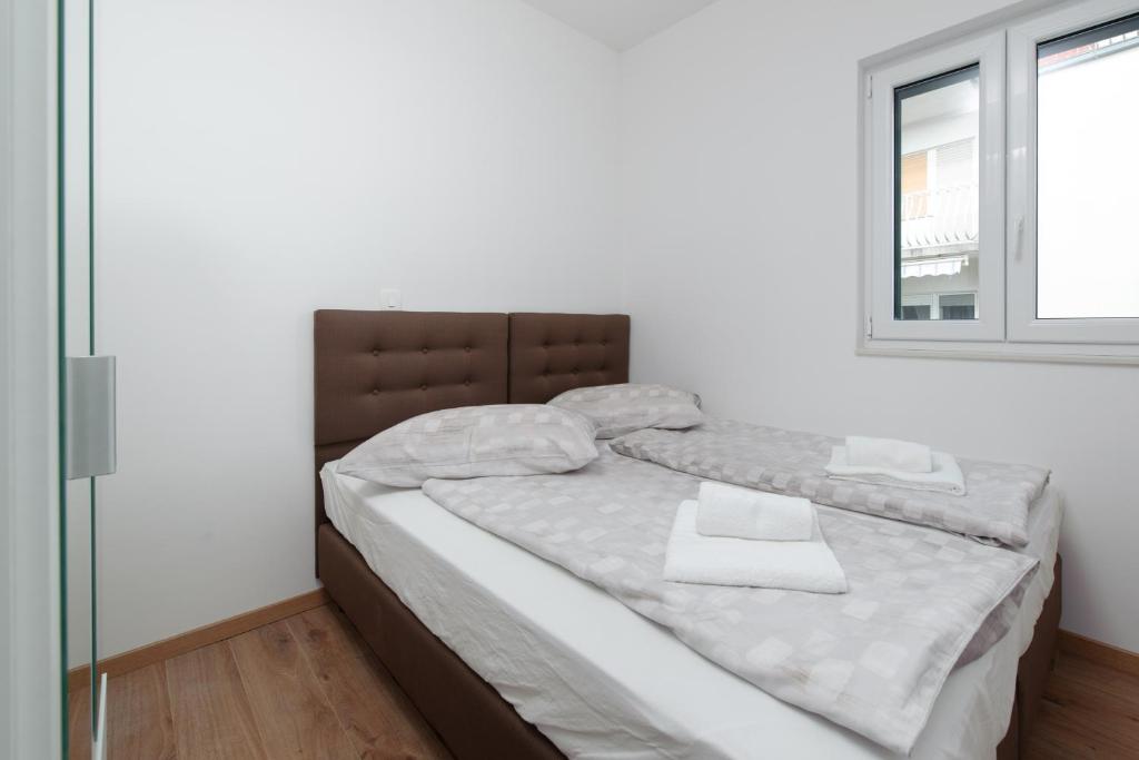 Postel nebo postele na pokoji v ubytování NERA lux apartment