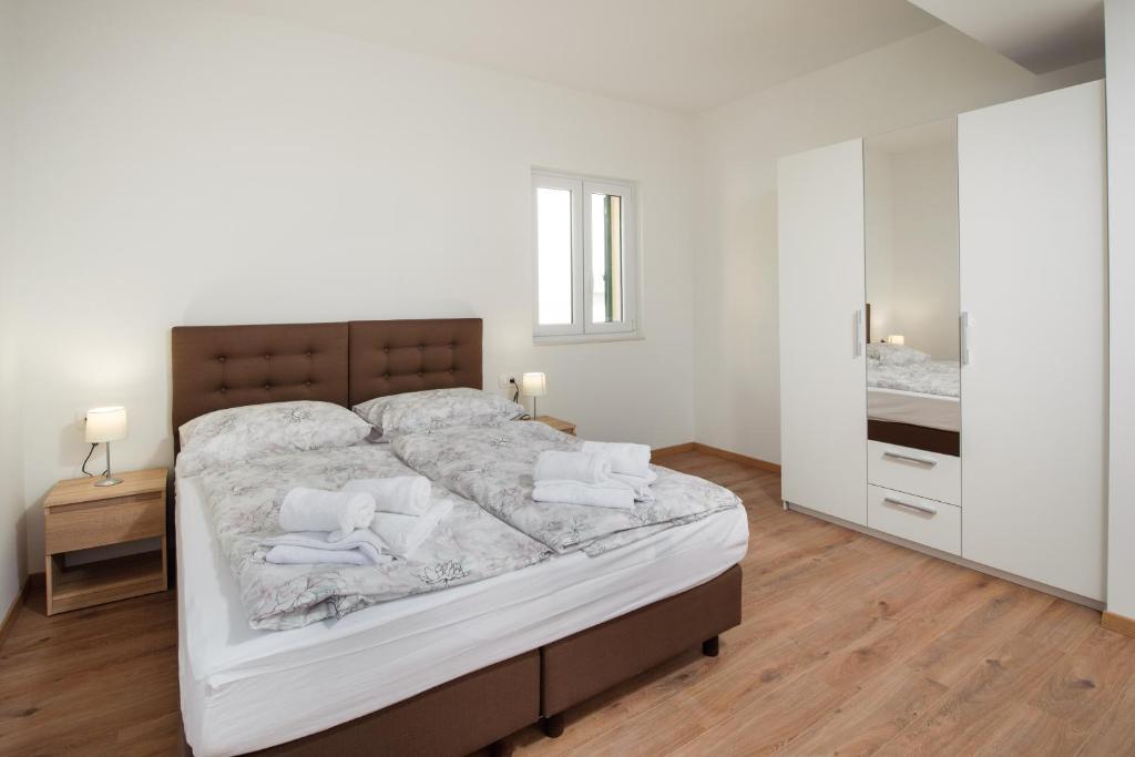 Postel nebo postele na pokoji v ubytování NERA lux apartment