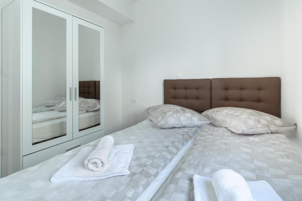 Postel nebo postele na pokoji v ubytování NERA lux apartment