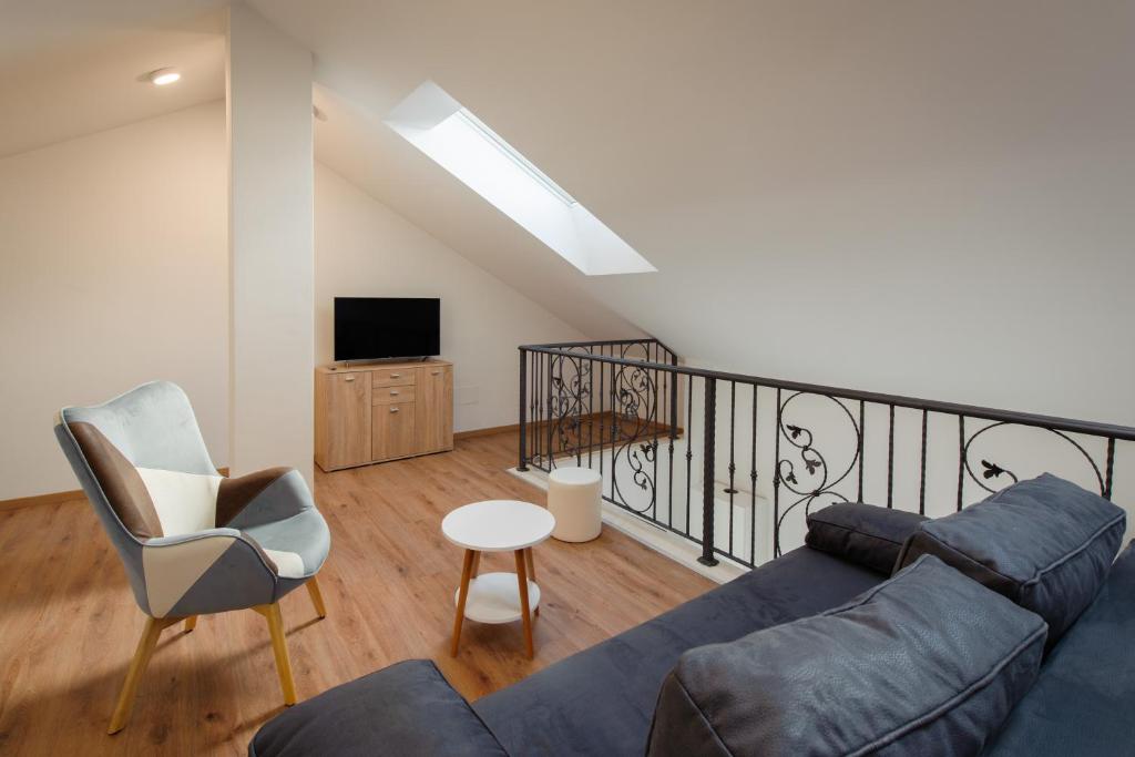 TV a/nebo společenská místnost v ubytování NERA lux apartment