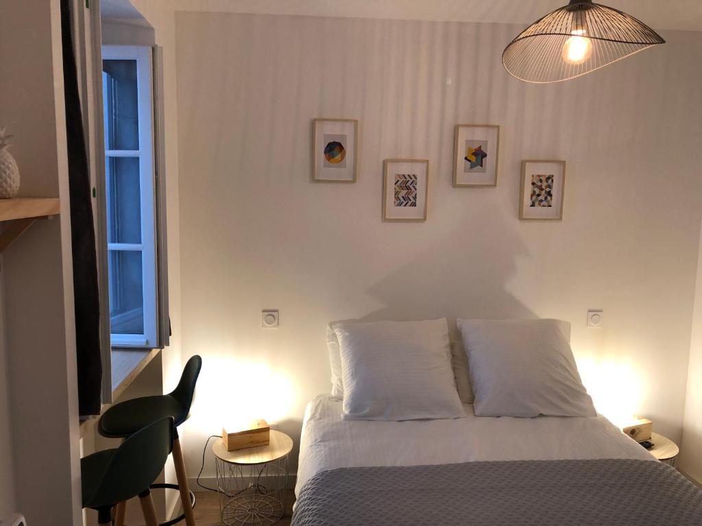 Postel nebo postele na pokoji v ubytování Maison Simonenia
