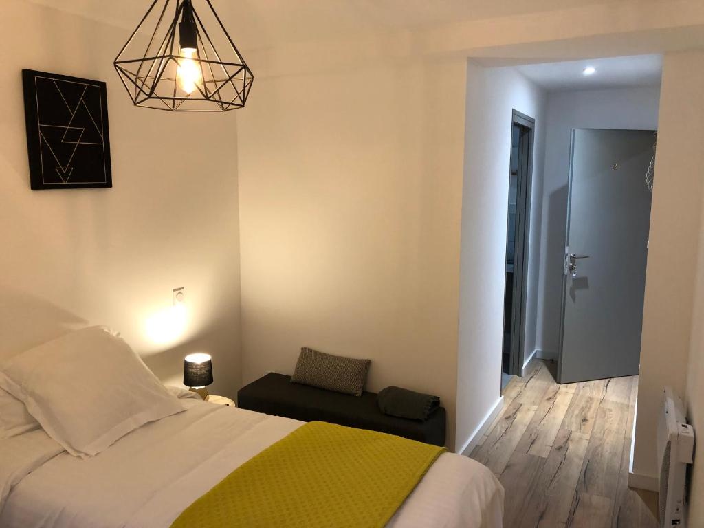 Postel nebo postele na pokoji v ubytování Maison Simonenia