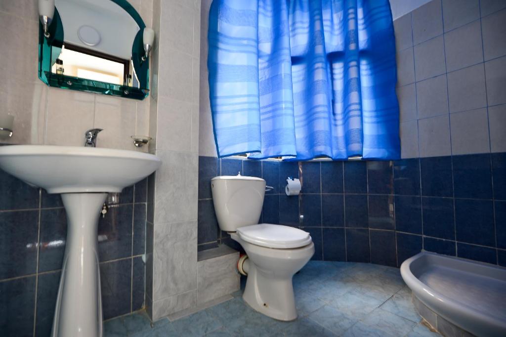 Koupelna v ubytování Hotel Niku