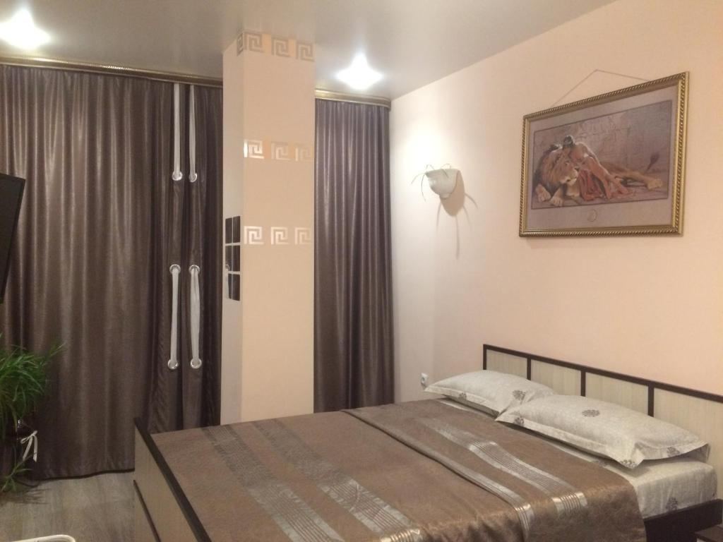 Llit o llits en una habitació de Apartment on Sovetskaya