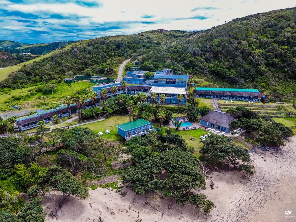 an aerial view of a house on a beach at Ocean View Hotel in Coffee Bay