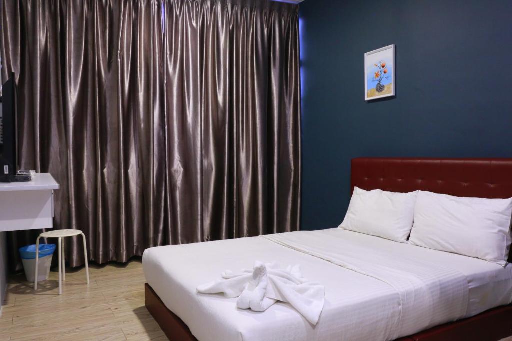 Postel nebo postele na pokoji v ubytování The b'Hotel