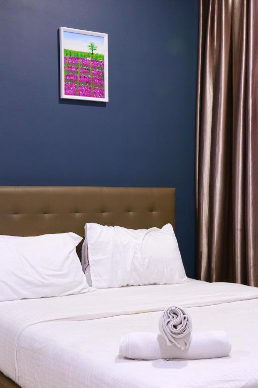Postel nebo postele na pokoji v ubytování The b'Hotel