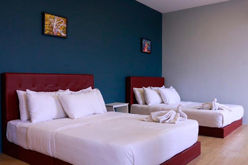 Postel nebo postele na pokoji v ubytování The b'Hotel