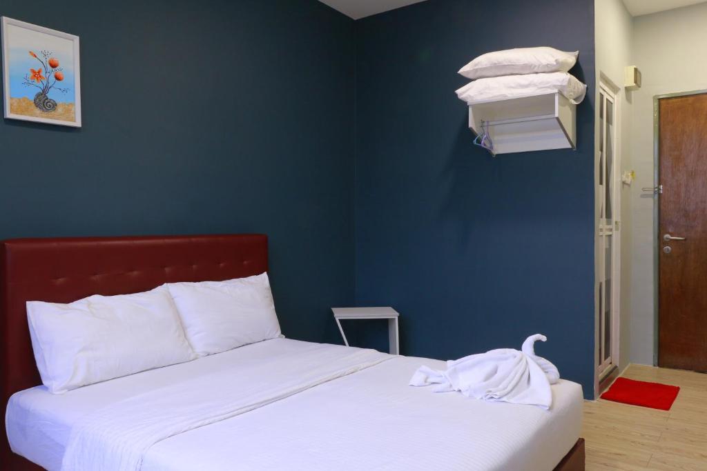 Postel nebo postele na pokoji v ubytování The b'Hotel