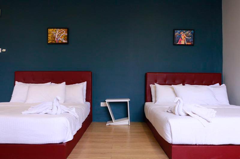 Postel nebo postele na pokoji v ubytování The b'Hotel