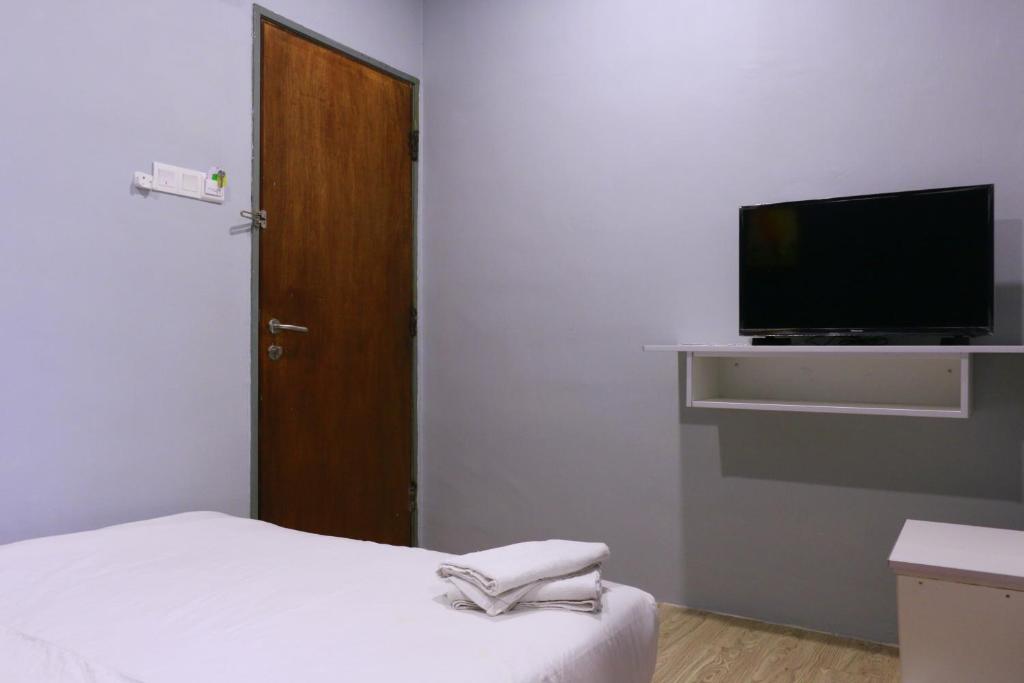 TV a/nebo společenská místnost v ubytování The b'Hotel
