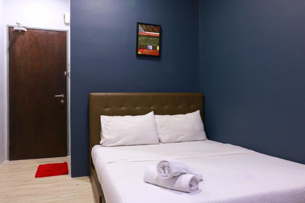 Postel nebo postele na pokoji v ubytování The b'Hotel