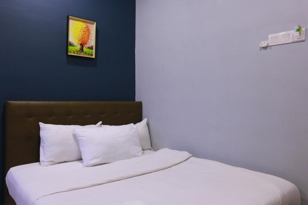 Postel nebo postele na pokoji v ubytování The b'Hotel