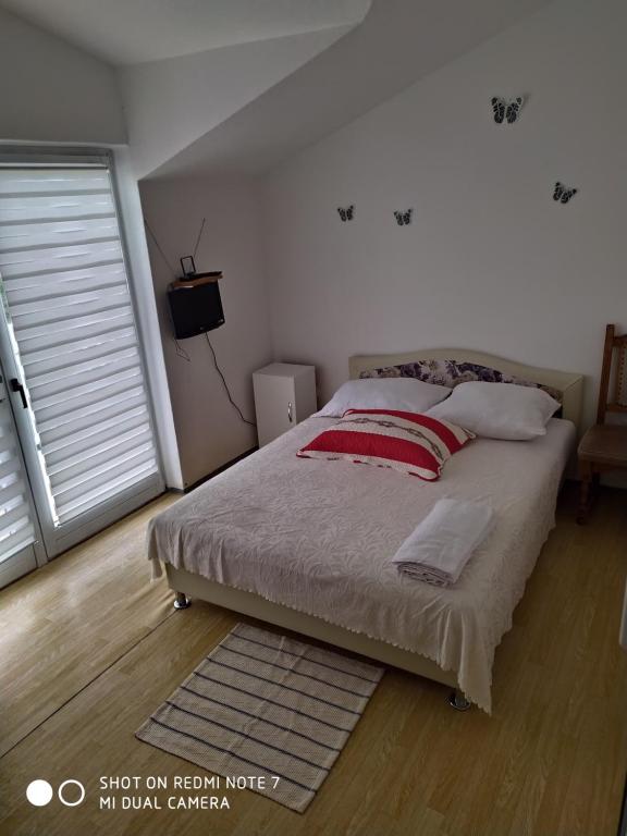 Posteľ alebo postele v izbe v ubytovaní Apartmant Sučić