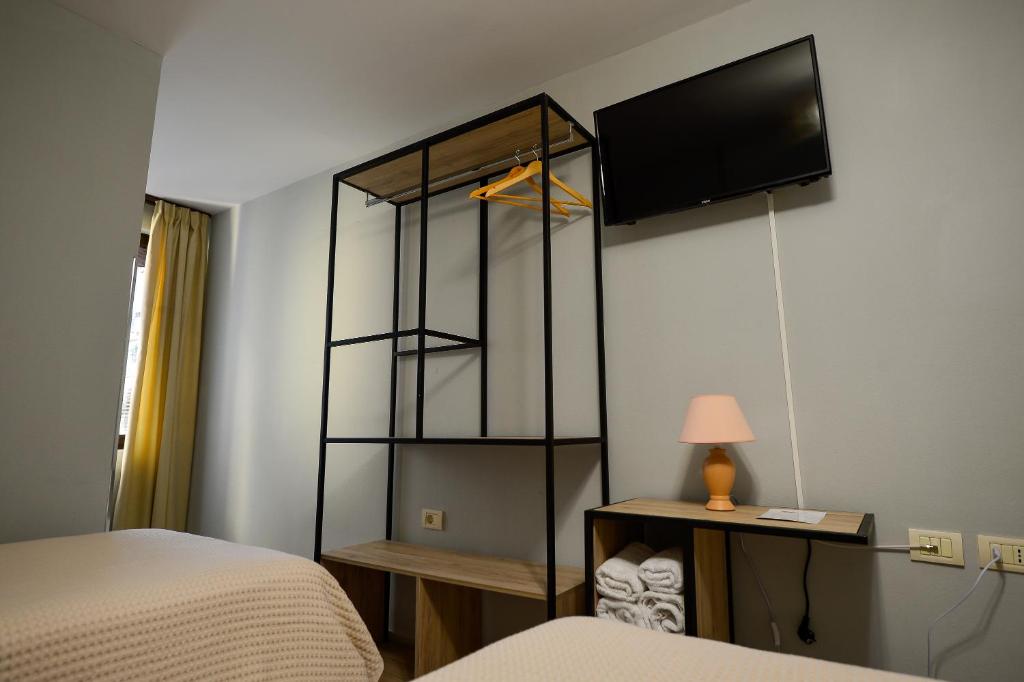 Postel nebo postele na pokoji v ubytování Hotel Niku