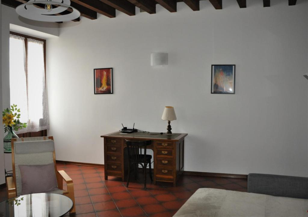 A seating area at Appartamento Le Volte