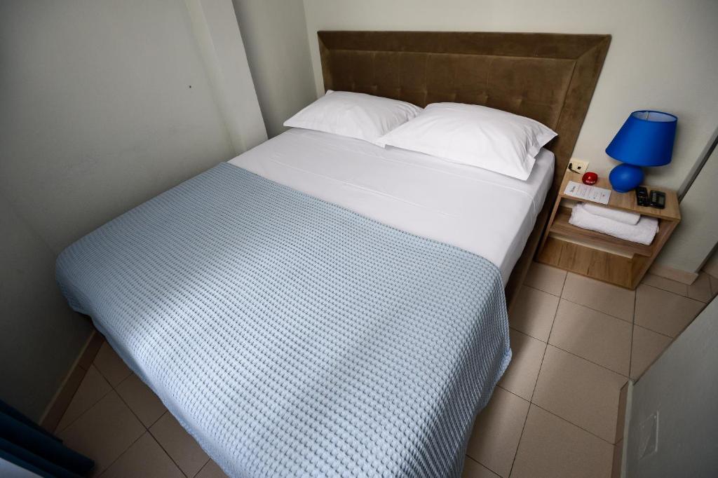 Postel nebo postele na pokoji v ubytování Hotel Niku