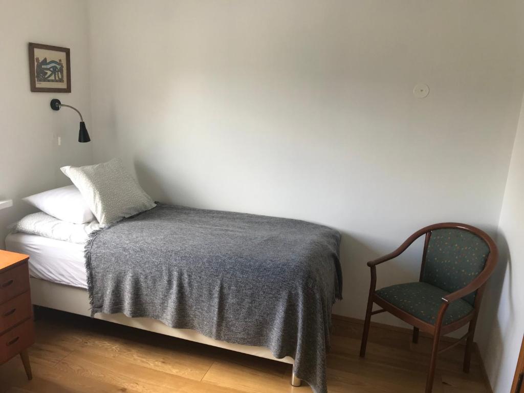 Postel nebo postele na pokoji v ubytování Spói Guesthouse
