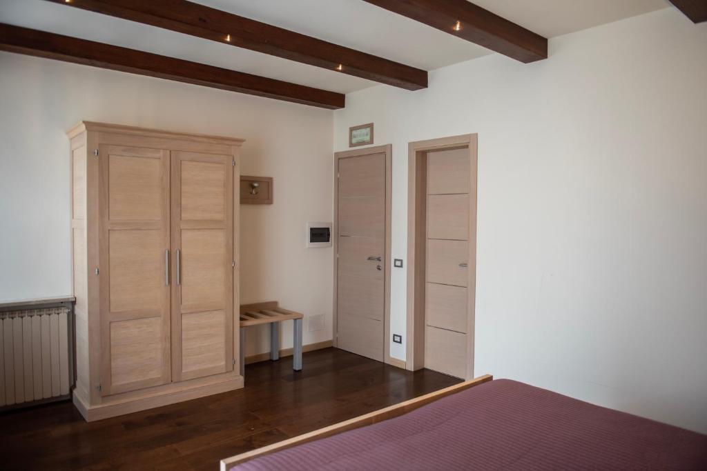 Postel nebo postele na pokoji v ubytování HOTEL - BAR DA NATALE