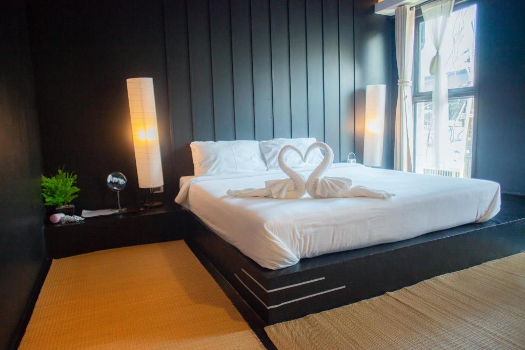 Postel nebo postele na pokoji v ubytování Trat 101 Hotel - SHA Certified