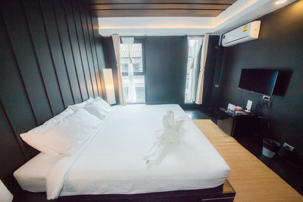 Postel nebo postele na pokoji v ubytování Trat 101 Hotel - SHA Certified