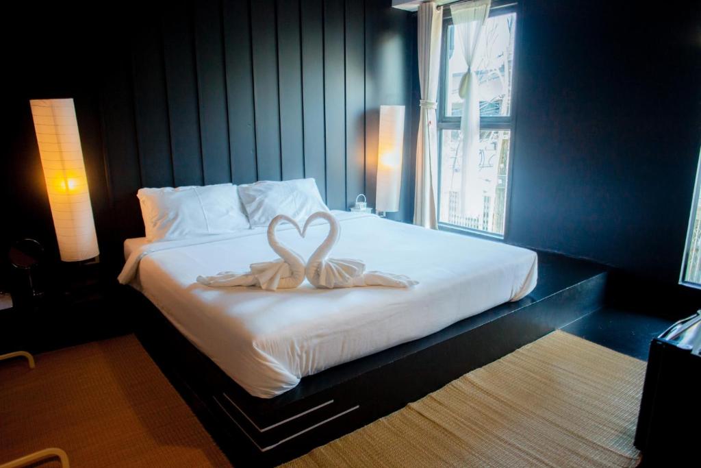Postel nebo postele na pokoji v ubytování Trat 101 Hotel - SHA Certified