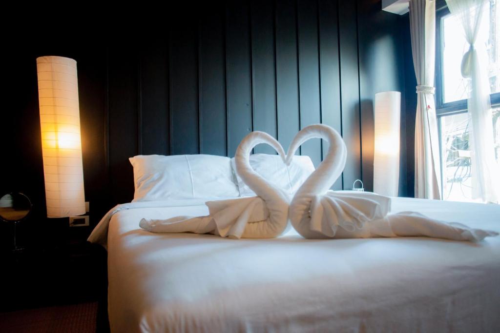 Postel nebo postele na pokoji v ubytování Trat 101 Hotel - SHA Certified