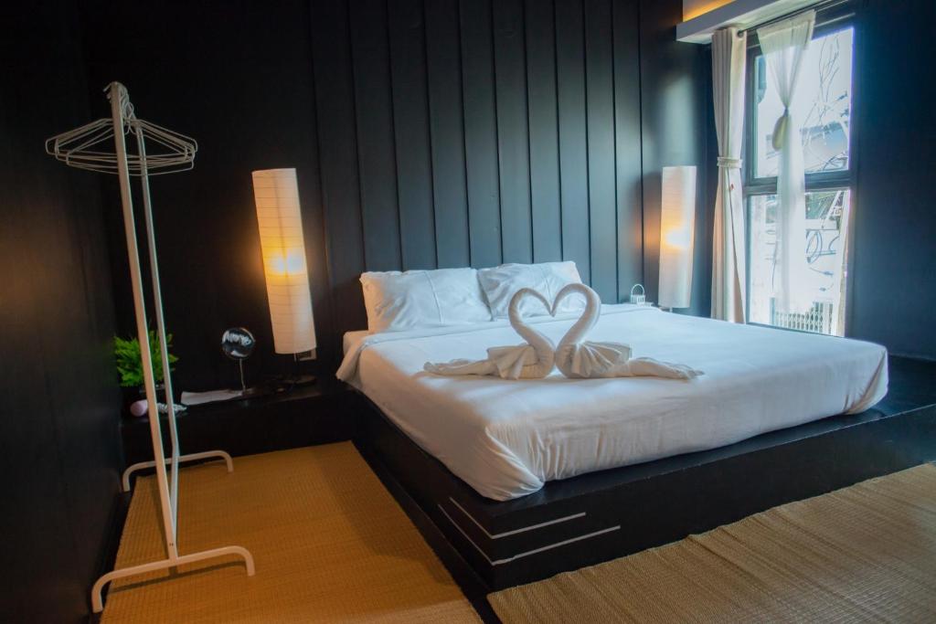 Postel nebo postele na pokoji v ubytování Trat 101 Hotel - SHA Certified